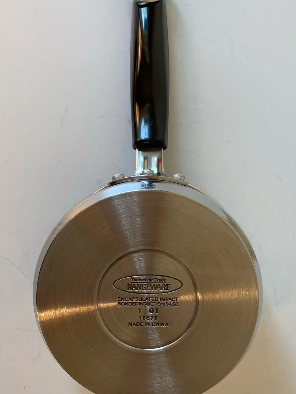 Stainless Steel Saucepan with Black Handle and Lid